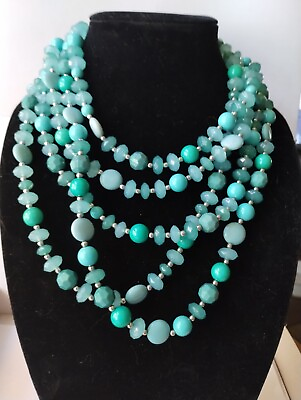#ad 5 multi strands of faux turquoise beads with silver tone spacer beads Lucite.