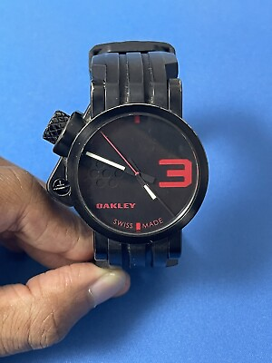 #ad RARE OAKLEY TRANSFER CASE WATCH Swiss Made Stainless Stealth Black w Red Dial