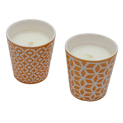 #ad Geometric Harmony: Pair of Scented Candles in Orange and White Holders