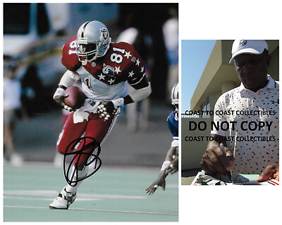 #ad Tim Brown signed Oakland Raiders football 8x10 photo Proof COA autographed LA