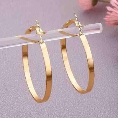 #ad Golden Glossy Hoop Earrings