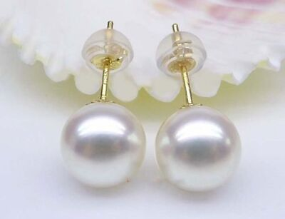 #ad a pair of natural round 6 5mm south seas white pearl earrings 18K