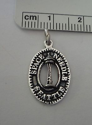 #ad Sterling Silver 21x13mm oval says Space Needle Seattle Washington Charm