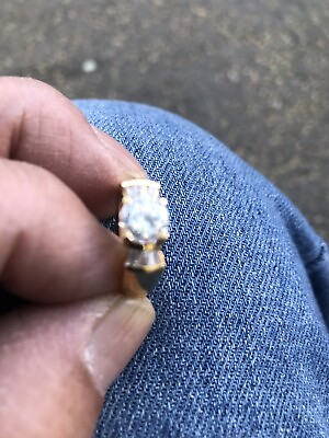 #ad An Engagement Diamond Ring With 20 K Yellow Gold