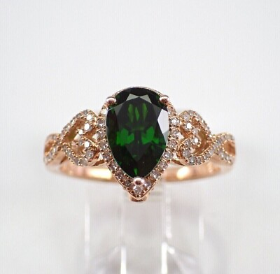 #ad Lab Created 3Ct Pear Cut Emerald Halo Women#x27;s Wedding Ring 14K Rose Gold Plated