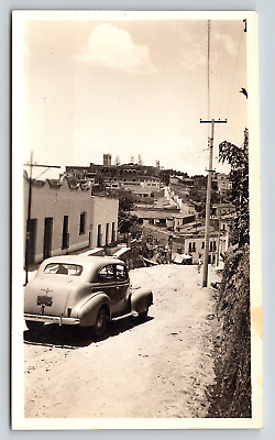 #ad Photograph Vintage Automobile Snapshot Car Driving On Hill Landscape Buildings