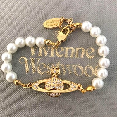 #ad Vivienne Westwood Gold White Pearl Bracelet