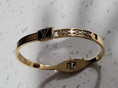 #ad LOUIS V bangle bracelet Gold And Black tone size 7 stainless steel.
